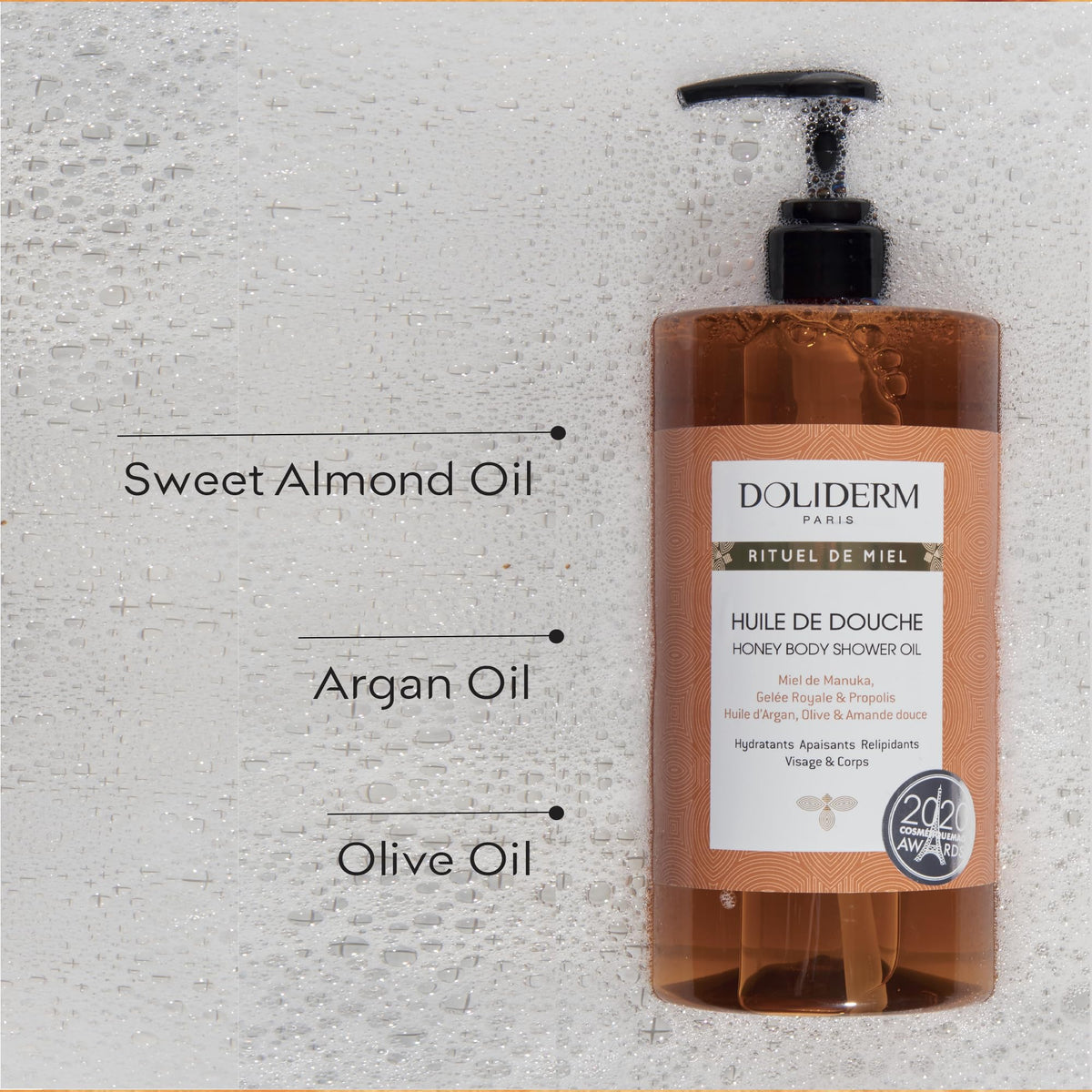 Doliderm Paris Honey Shower Oil label highlights hive ingredients for moisturized skin