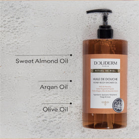 Doliderm Paris Honey Shower Oil label highlights hive ingredients for moisturized skin