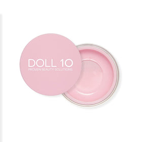 DOLL 10 NO Pink Power Brightening Powder packaging, compact and travel-ready for daily use.