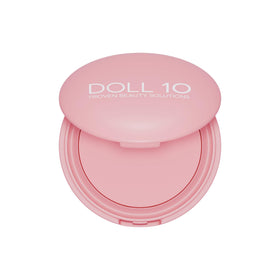 Doll 10 Pink Power Pressed Powder compact close-up showing brightening, soft-focus finish