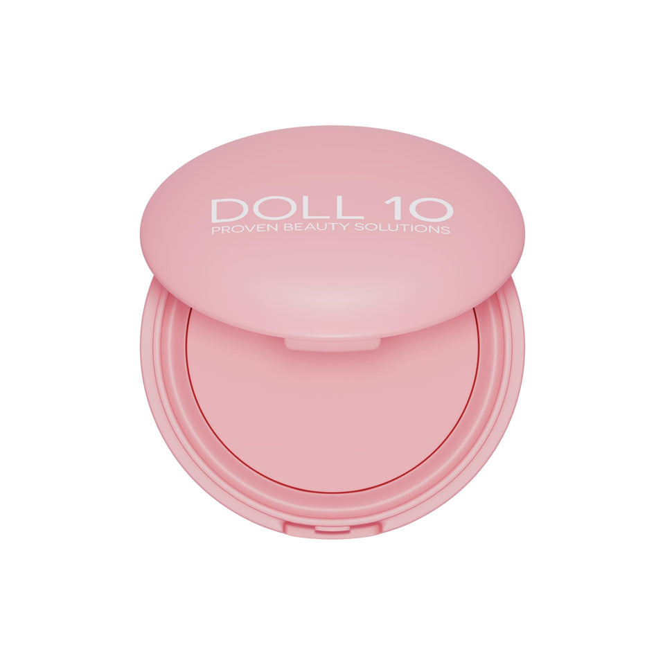 Doll 10 Pink Power Pressed Powder compact close-up showing brightening, soft-focus finish