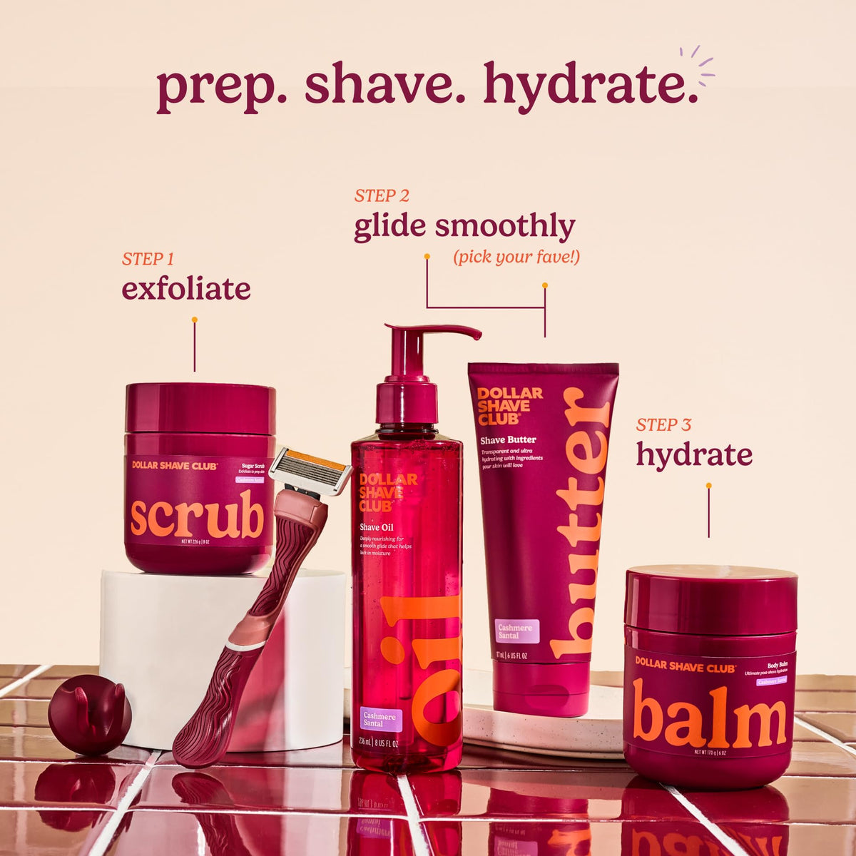 Shave oil bottle beside a shower setup from Dollar Shave Club For Women.