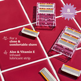 Dollar Shave Club Women 6-blade razor close-up shows contour blades for curves.