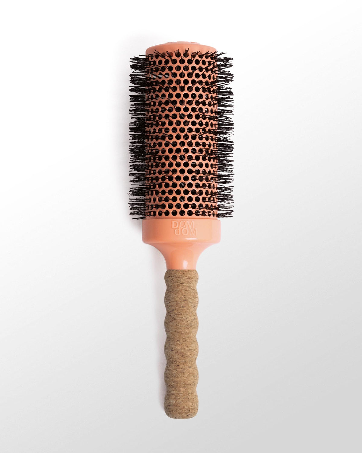 Dom Dom Ceramic Brush #6 angled view highlights lightweight grip
