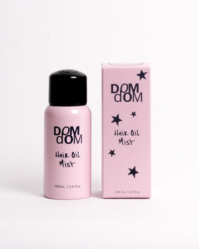 Dom Dom Hair Oil Mist bottle demonstrates lightweight hydration for all hair types