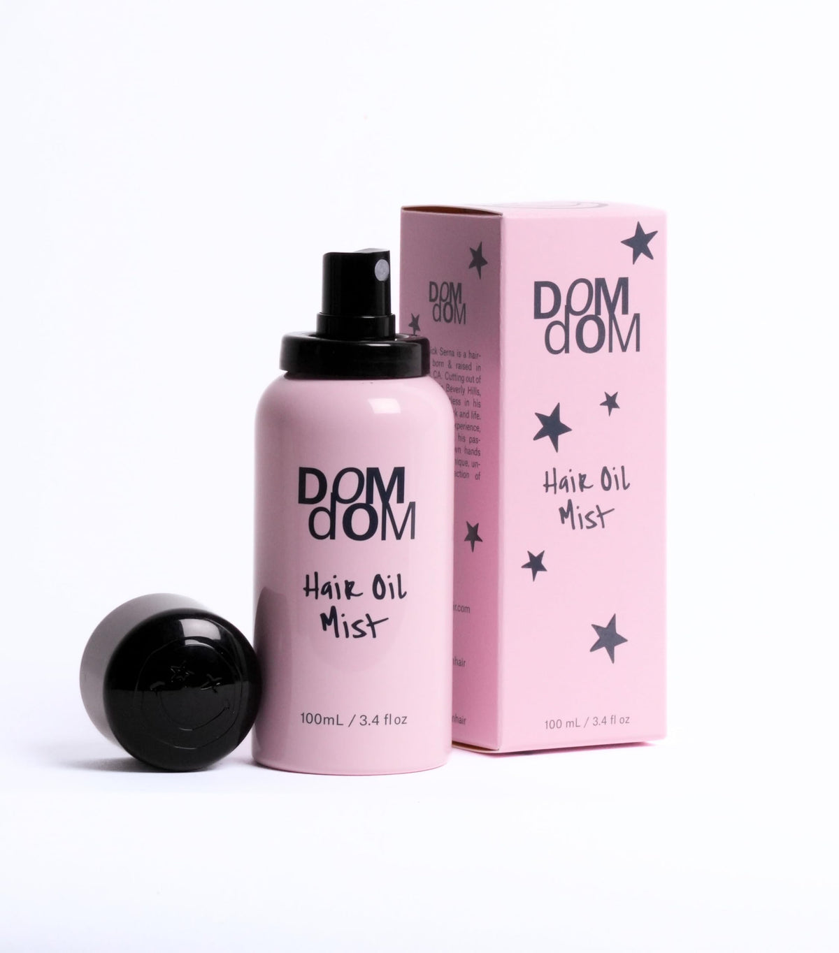Dom Dom Hair Oil Mist spray shows even application for smooth, frizz-free results