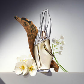 Donna Karan Cashmere Mist creme texture swirl highlights luxurious, fast-absorbing hydration