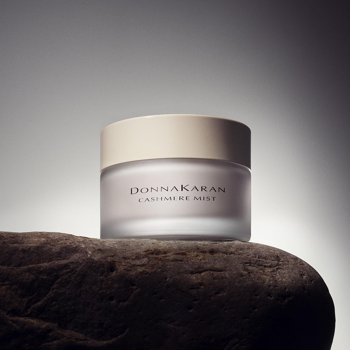 Donna Karan Cashmere Mist luxury body creme display conveys indulgent care and scent