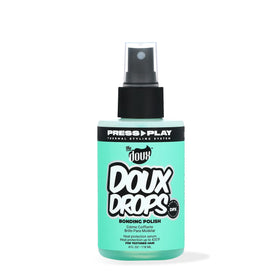 The Doux Drops Bonding Polish Spray bottle ready for smoothing frizz and shine