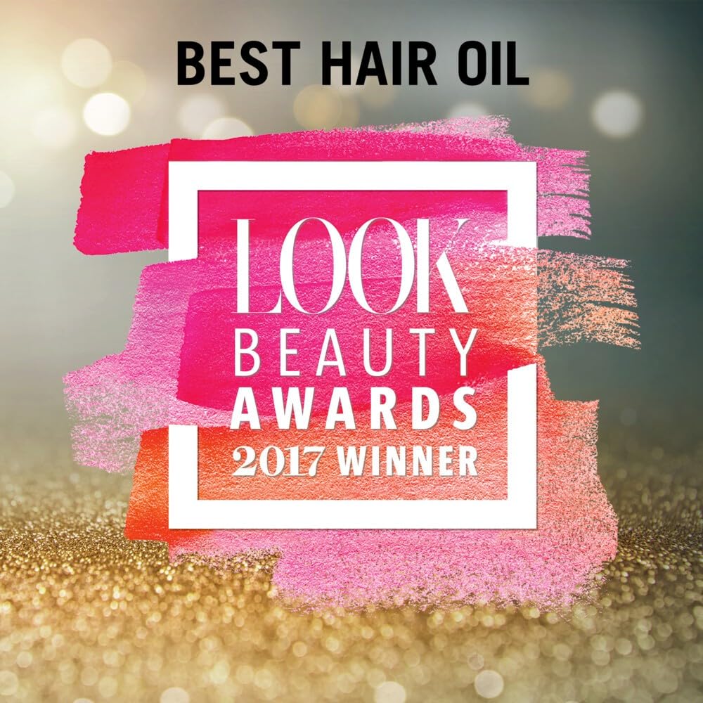 Dove Keratin Smooth Shine Oil on hair for added shine