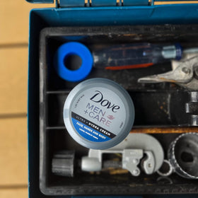 Dove Men+Care Ultra Hydra Cream on body during application.