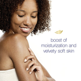 Close-up of Dove bottle and creamy wash texture.