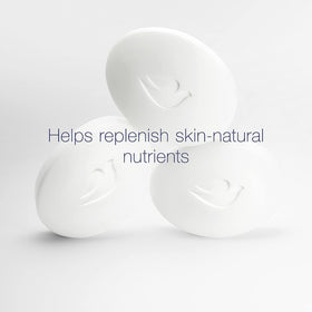 Dove sensitive bar foam close-up shows gentle cleansing action