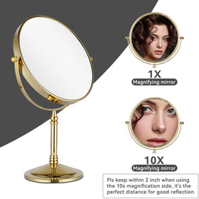 DOWRY two-sided swivel mirror in gold finish for versatile viewing.