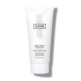 dpHUE Color Fresh Conditioner bottle pouring for vibrant color retention and easy styling.