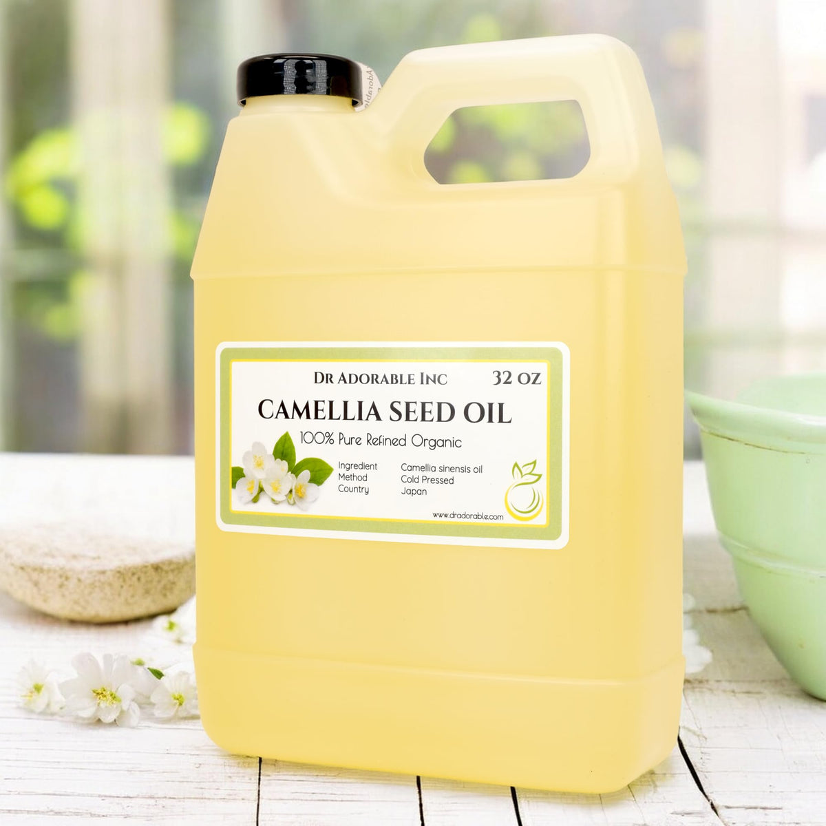 Dr Adorable Camellia Seed Oil pour demonstrates fast-absorbing hydration for face and body.