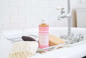 Dr. Bronner's Cherry Blossom lather demonstrates gentle cleansing by hand.