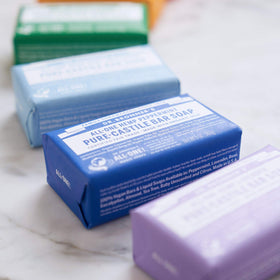 Dr. Bronner's Pure-Castile bar soap with organic oils for gentle cleansing.