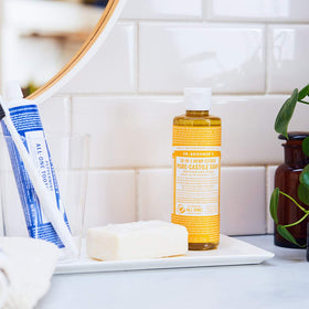 Dr. Bronner's Pure-Castile Rose bottle offers gentle floral cleansing for skin