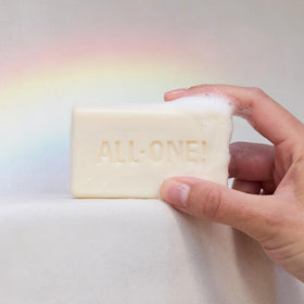 User holding Cherry Blossom bar to highlight travel-friendly 5 oz size