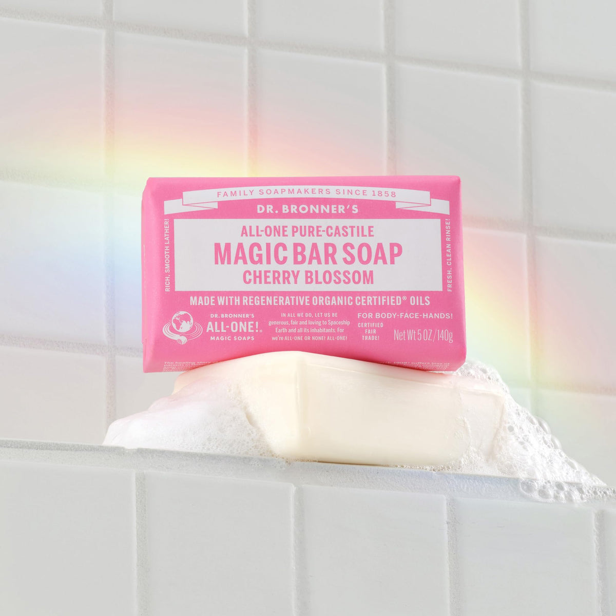 Cherry Blossom bar lather close-up showing creamy suds and clean rinse