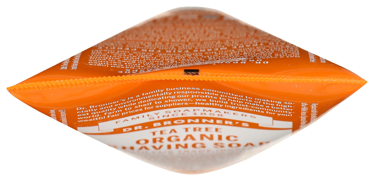 Dr. Bronner's Tea Tree Shave Gel label texture and caramel color detail.