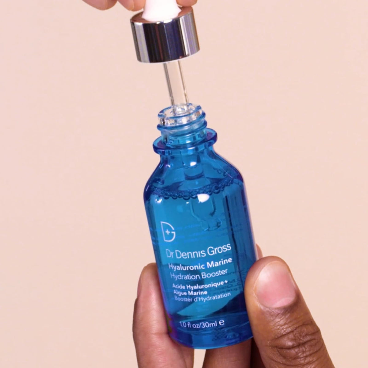 Close-up of dewy, hydrated skin powered by Dr Dennis Gross Hydration Booster