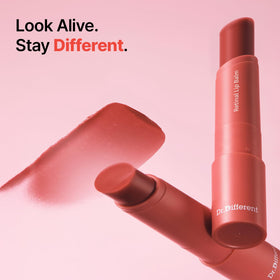 Dr.Different retinal lip balm tinted swatch demonstrates smooth color and moisture.