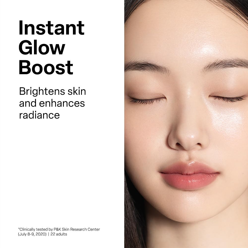 Dr. G Brightening Vita Peeling Pad applied on the cheek for gentle exfoliation.