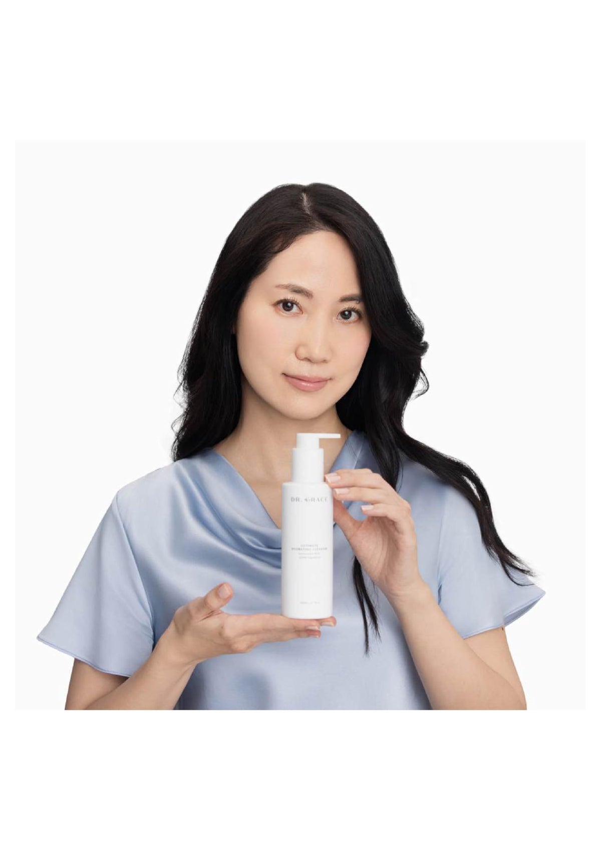 Minimalist Dr. Grace packaging on a clean surface for a simple skincare routine.