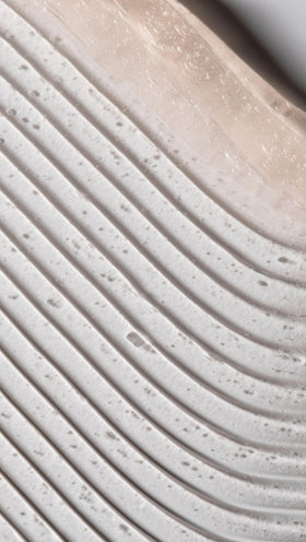 Dr. Loretta eye-area application close-up shows gentle patting technique for contour tightening.