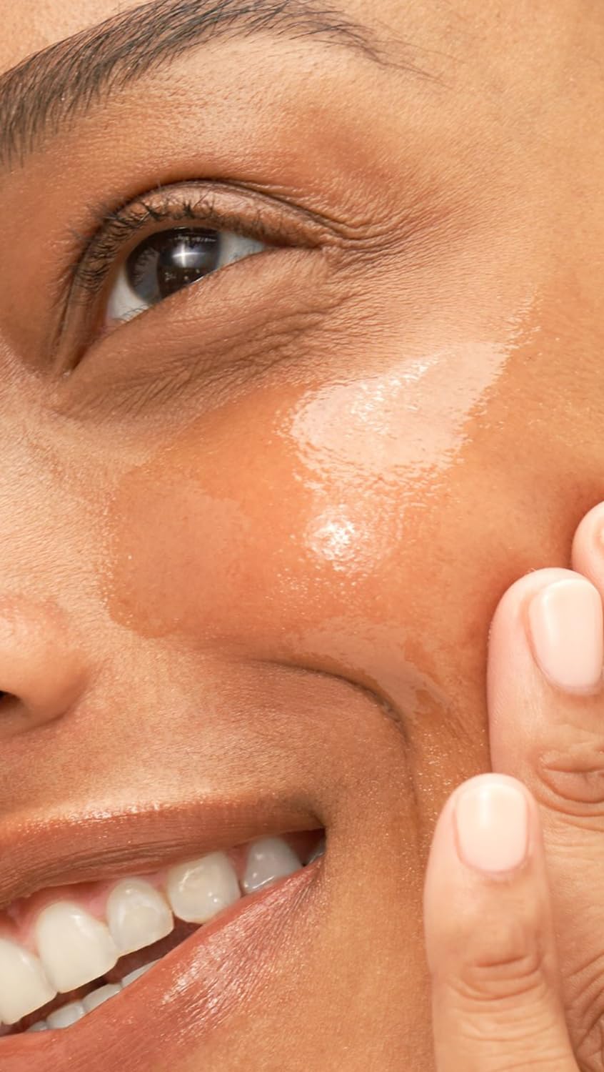 Gentle application on face and neck with Dr. Loretta serum.
