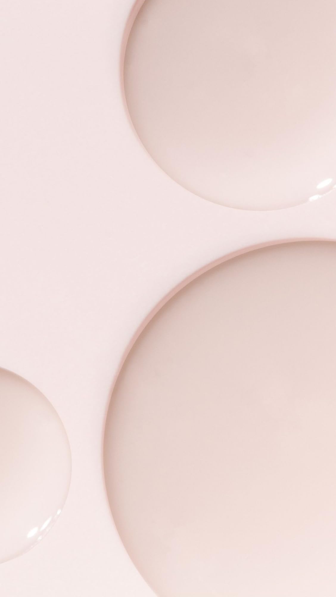 Texture close-up of Dr. Loretta serum's silky formula.