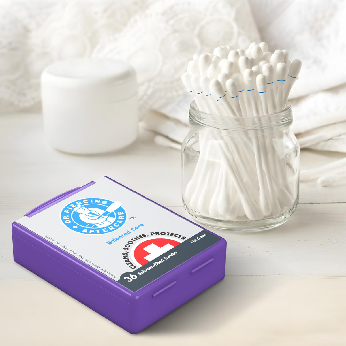 DR. PIERCING AFTERCARE belly button cleaning demonstrates external piercing care.