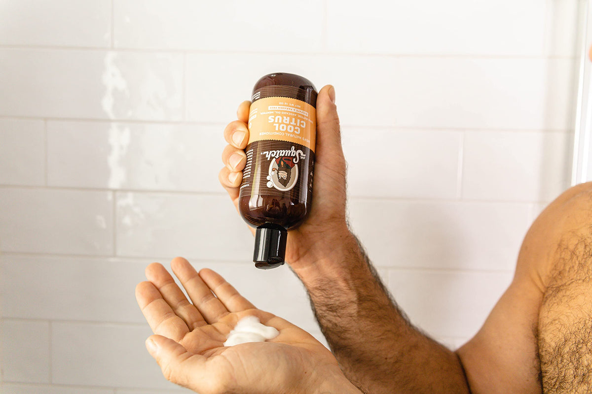 Dr. Squatch Cool Citrus Conditioner packaging on shelf conveys premium citrus fragrance
