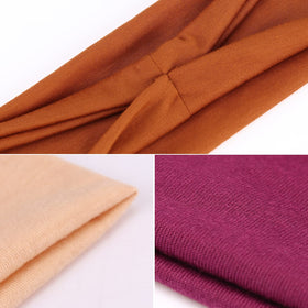Close-up of DRESHOW headband fabric showing soft stretch and comfort.