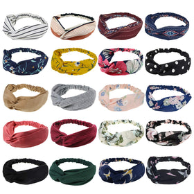 DRESHOW turban headbands with back elastic and cross-front knot for secure, stylish everyday wear.