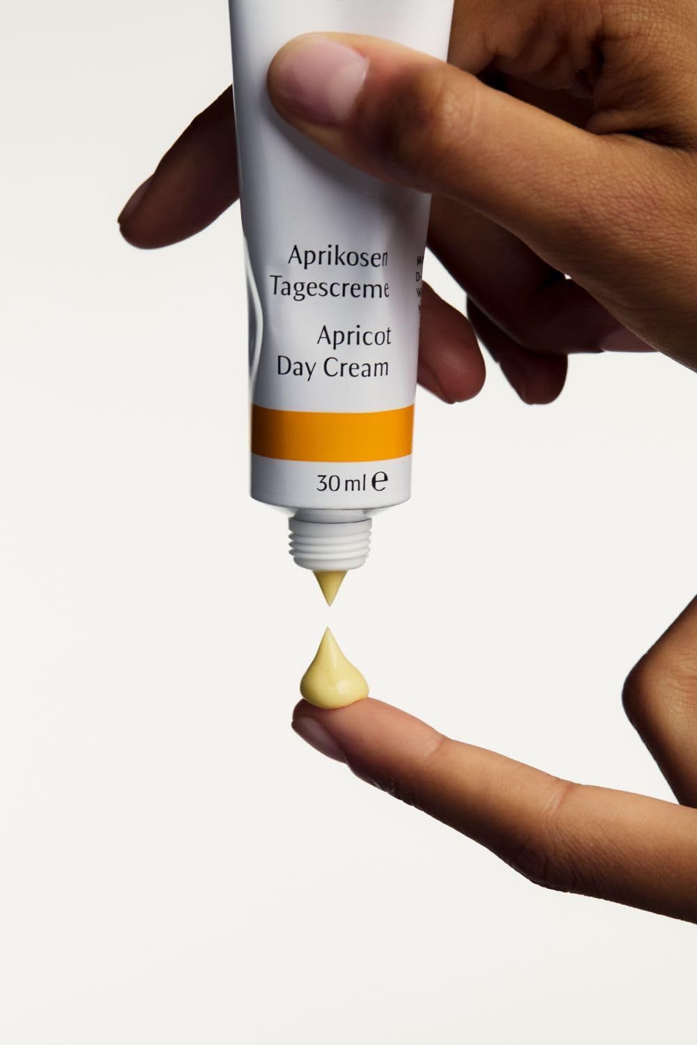 Packaging and pump bottle in a clean, elegant setup