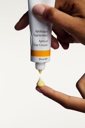 Packaging and pump bottle in a clean, elegant setup