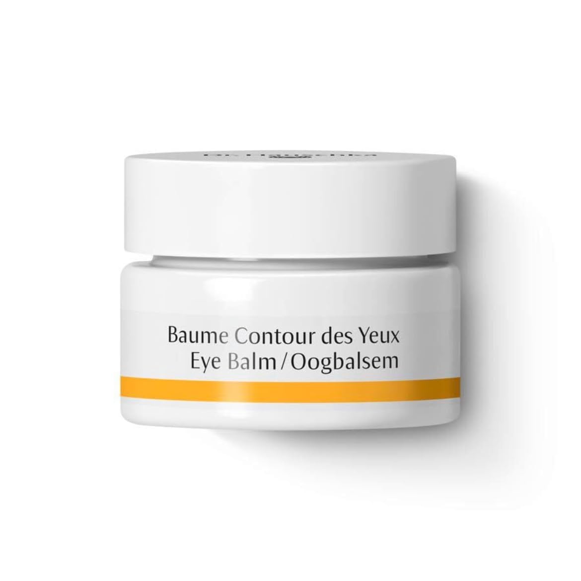Dr. Hauschka Eye Balm jar close-up, nourishing texture for delicate eye skin.
