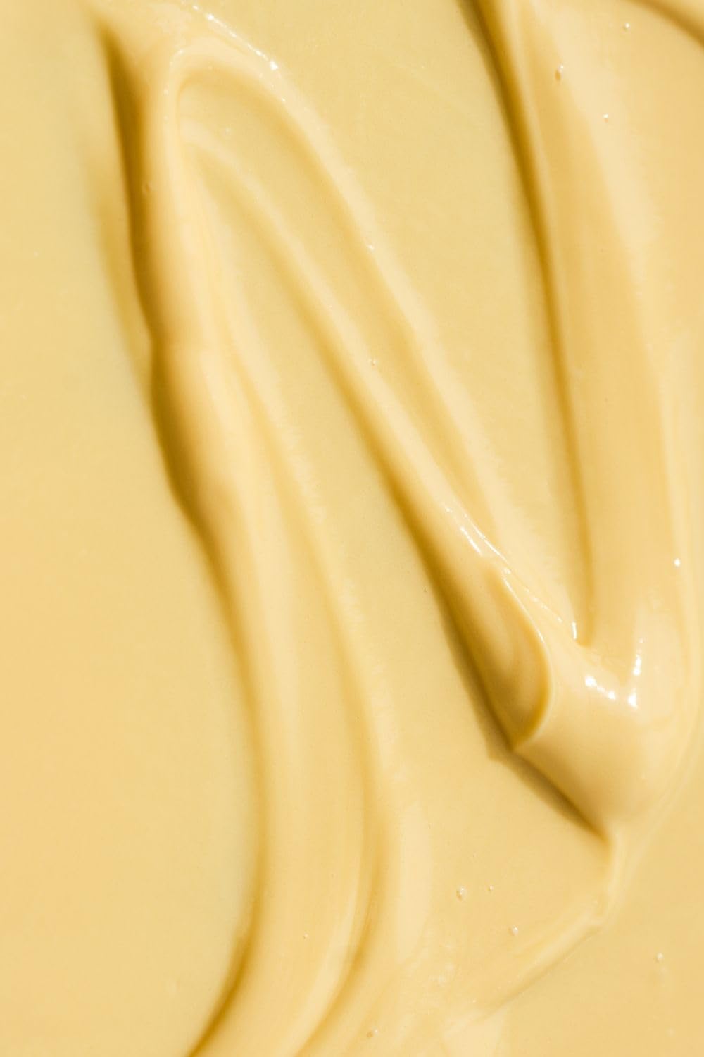 Close-up of a makeup-ready, hydrated complexion using the cream