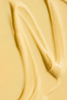 Close-up of a makeup-ready, hydrated complexion using the cream