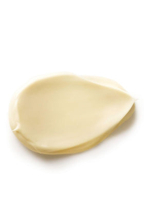 Close-up of Dr. Hauschka Melissa Day Cream texture showing light, creamy finish