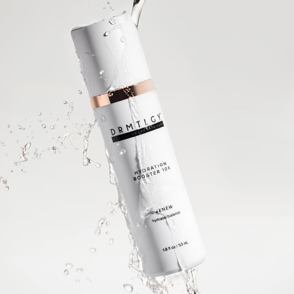 Close-up of DRMTLGY Hydration Booster bottle highlighting lightweight, fast-absorbing formula.