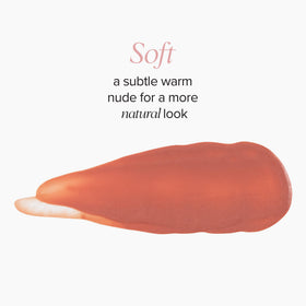 DRMTLGY Lip Silk SPF 40 Bold Tint on lips delivers vibrant color with SPF protection.