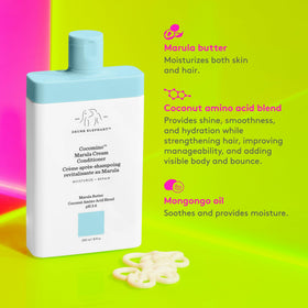 Drunk Elephant Cocomino Marula Cream Conditioner creamy texture ready to glide through hair.