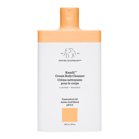 Drunk Elephant Kamili Cream Body Cleanser bottle close-up for gentle cleansing on sensitive skin