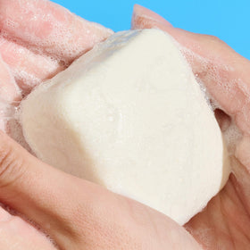 Drunk Elephant Pekee Bar wet face ready for cleansing