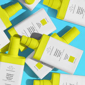 Drunk Elephant Wild Marula Tangle Spray before heat styling to help protect strands.