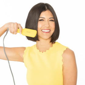 Drybar Baby Brush Crush Mini reaches 400°F for fast smoothing sessions.